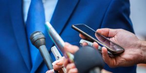 Businessman giving crisis communication press conference